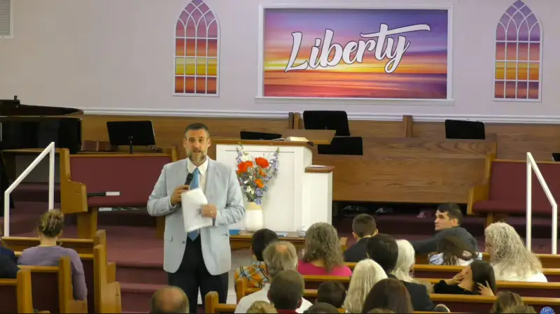 Pastor preaching to the congregation
