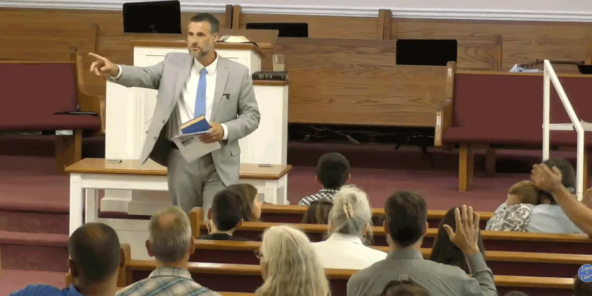 Pastor Fannin preaching from the Bible